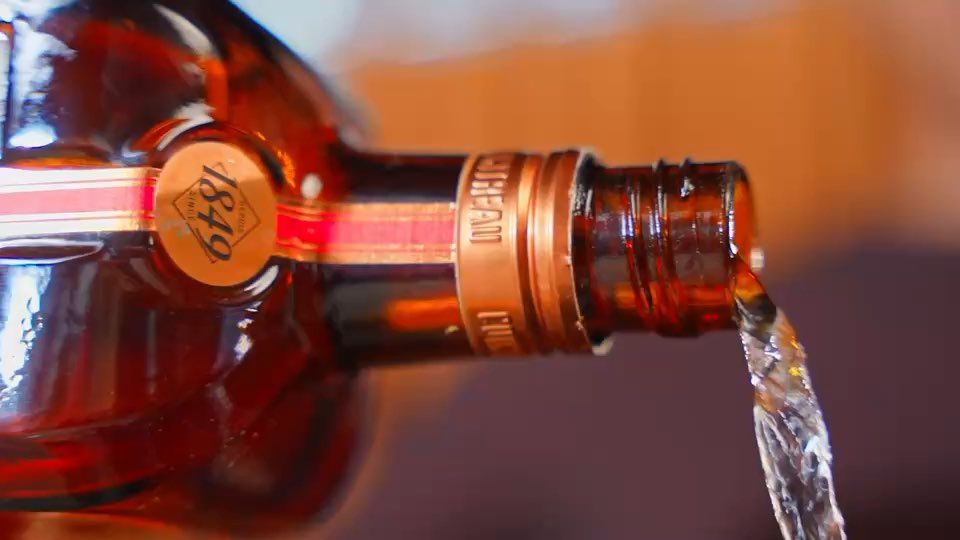 A guest picks a drink on the Barsys app and the 360 pours it.